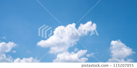 Beautiful blue sky and white cumulus clouds abstract background. Cloudscape background. Blue sky and fluffy white clouds on sunny days. Beautiful blue sky. World Ozone Day. Ozone layer. Summer sky. Beautiful blue sky and white cumulus clouds abstract background. Cloudscape background. Blue sky and fluffy white clouds on sunny days. Beautiful blue sky. World Ozone Day. Ozone layer. Summer sky. 115207855