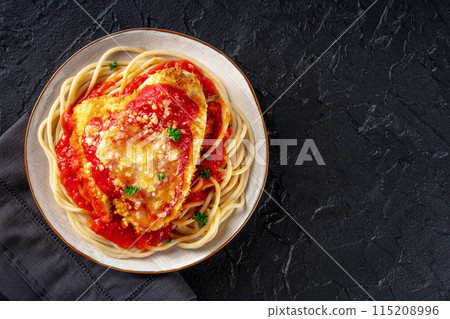 Chicken Parmesan, Italian pasta dish. Breaded chicken breast with cheese 115208996