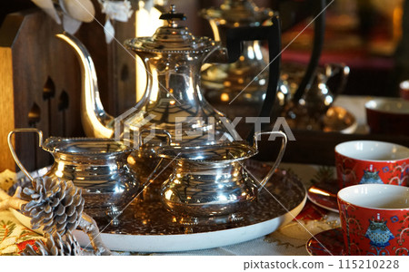 Silver teapot and teacups Silver teapot and teacups 115210228