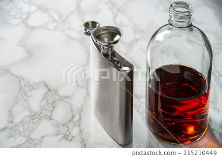 Whiskey bottle and flask 115210449