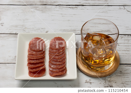 Whisky on the rocks and snacks 115210454
