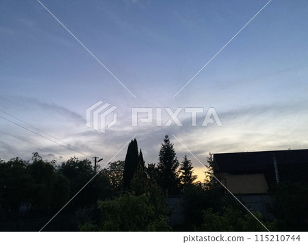 Clouds over countryside as weather changes 115210744