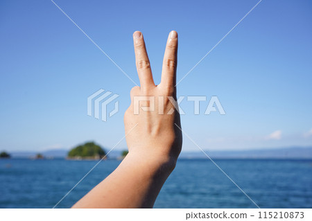 Hands and sky 115210873