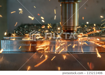 The burning chip from wear cutting tools on CNC milling machine. 115211406