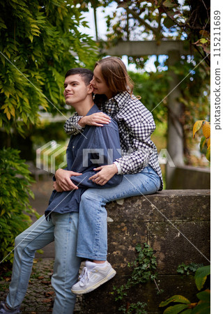 Warm Embrace of Teen Love in the Autumn Park. Capturing Teen Moments: Love Blossoms in Autumn's Embrace. Teenagers in Love: Embracing the Autumn Vibe Warm Embrace of Teen Love in the Autumn Park. Capturing Teen Moments: Love Blossoms in Autumn's Embrace. Teenagers in Love: Embracing the Autumn Vibe 115211689