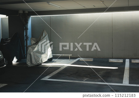 Light shining into the parking lot 115212183