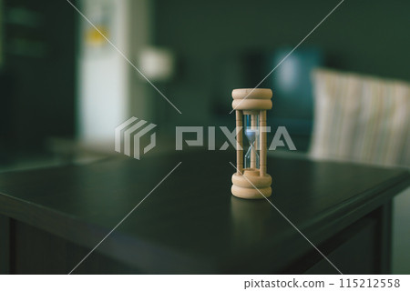 Room with an hourglass 115212558