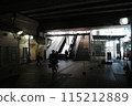 People walking under the underpass 115212889
