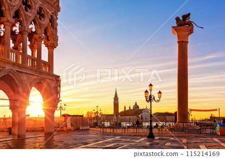 Beautiful sunrise view of Doge's Palace (Palazzo Ducale), Lion of Saint Mark and piazza San Marco in Venice, Italy. 115214169
