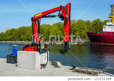 Port infrastructure element, a small hydraulic loader crane for lifting cargo from fishing vessels 115215394