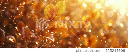Golden Autumn Leaves Shimmering in Afternoon Sunlight 115215606