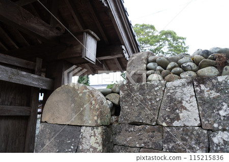 A pile of stones on the samurai residence street in Goto City, Nagasaki Prefecture 115215836