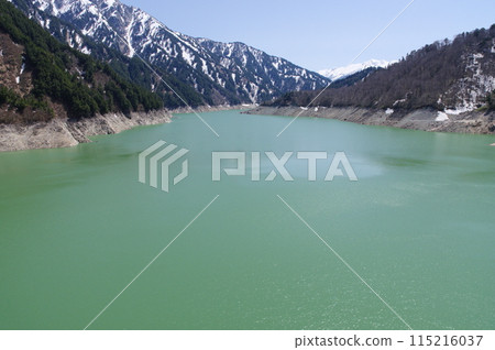View of Lake Kurobe from Kurobe Dam on the Tateyama Kurobe Alpine Route in early May 115216037