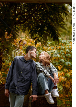 Warm Embrace of Teen Love in the Autumn Park. Capturing Teen Moments: Love Blossoms in Autumn's Embrace. Teenagers in Love: Embracing the Autumn Vibe Warm Embrace of Teen Love in the Autumn Park. Capturing Teen Moments: Love Blossoms in Autumn's Embrace. Teenagers in Love: Embracing the Autumn Vibe 115216046
