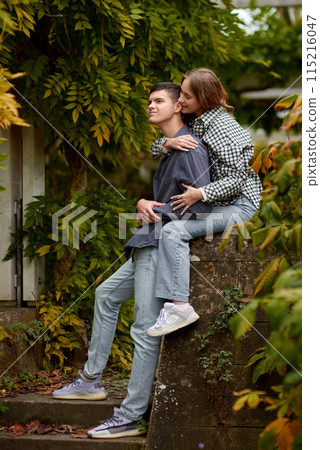 Warm Embrace of Teen Love in the Autumn Park. Capturing Teen Moments: Love Blossoms in Autumn's Embrace. Teenagers in Love: Embracing the Autumn Vibe Warm Embrace of Teen Love in the Autumn Park. Capturing Teen Moments: Love Blossoms in Autumn's Embrace. Teenagers in Love: Embracing the Autumn Vibe 115216047