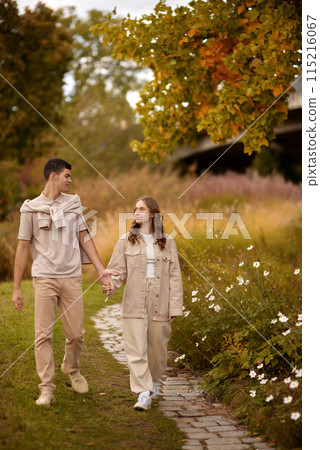 Warm Embrace of Teen Love in the Autumn Park. Capturing Teen Moments: Love Blossoms in Autumn's Embrace. Teenagers in Love: Embracing the Autumn Vibe Warm Embrace of Teen Love in the Autumn Park. Capturing Teen Moments: Love Blossoms in Autumn's Embrace. Teenagers in Love: Embracing the Autumn Vibe 115216067