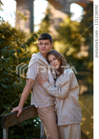 Warm Embrace of Teen Love in the Autumn Park. Capturing Teen Moments: Love Blossoms in Autumn's Embrace. Teenagers in Love: Embracing the Autumn Vibe Warm Embrace of Teen Love in the Autumn Park. Capturing Teen Moments: Love Blossoms in Autumn's Embrace. Teenagers in Love: Embracing the Autumn Vibe 115216092