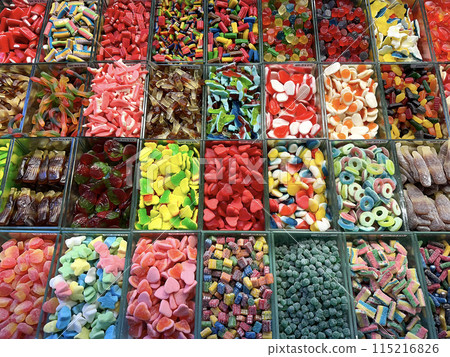 Counter with colorful candies 115216826