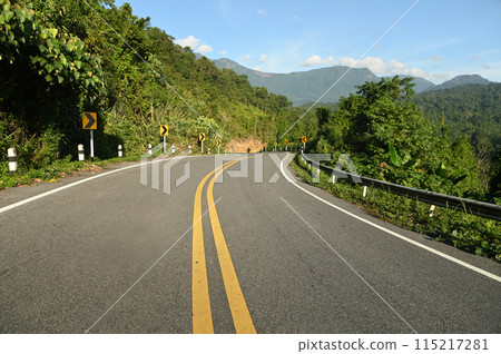 Open highway in scenic mountain landscape in Thailand. Open highway in scenic mountain landscape in Thailand. 115217281