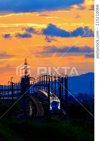 Shinkansen train running in the sunset 115218069
