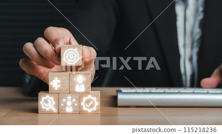 Advice concept, Businesswoman hand holding wooden block on desk with Advice icon on virtual screen. 115218236