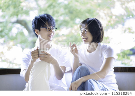 Young couple wearing glasses 115218294