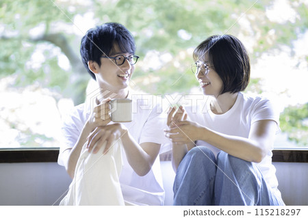Young couple wearing glasses Young couple wearing glasses 115218297
