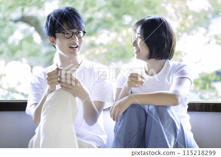 Young couple wearing glasses 115218299