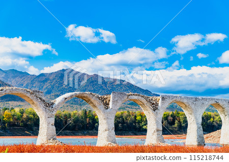 Taushubetsu River Bridge in autumn, Hokkaido Taushubetsu River Bridge in autumn, Hokkaido 115218744