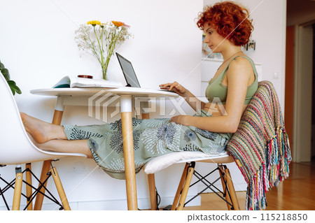 Portrait of teenage student girl using laptop, studying online Portrait of teenage student girl using laptop, studying online 115218850