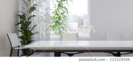 A space for displaying products on a white marble meeting table in a minimalist white meeting room. 115220589