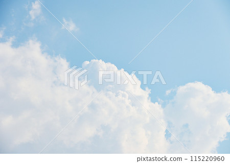 beautiful blue sky and white fluffy cloud with sunrise in the morning, natural background 115220960