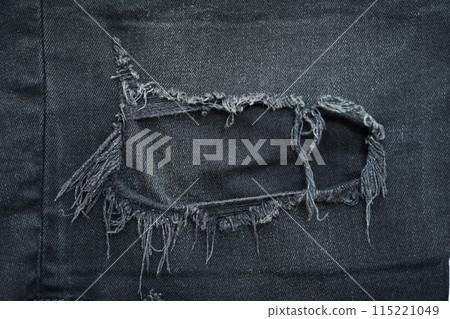 torn black danim texture background, textile of jeans fashion for clothing design 115221049