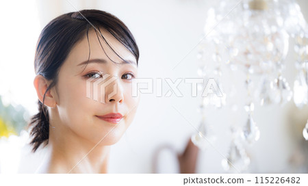 Beauty and beauty: A woman with beautiful, glowing skin looking at the camera Beauty and beauty: A woman with beautiful, glowing skin looking at the camera 115226482