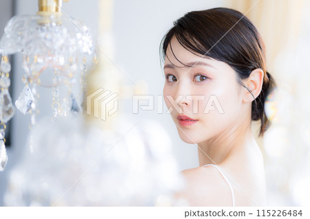 Beauty and beauty: A woman with beautiful, glowing skin looking at the camera Beauty and beauty: A woman with beautiful, glowing skin looking at the camera 115226484