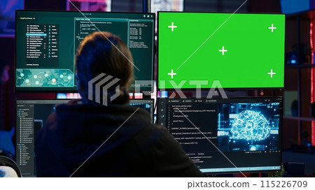 Hacker uses green screen PC and AI deep learning to develop zero day exploit undetectable by antivirus. Scammer uses artificial intelligence and mockup computer to build data mining script, camera A Hacker uses green screen PC and AI deep learning to develop zero day exploit undetectable by antivirus. Scammer uses artificial intelligence and mockup computer to build data mining script, camera A 115226709
