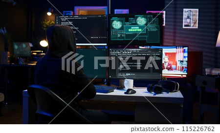 Happy man writing code on PC, celebrating after managing to get past security systems. Hacker using computer to make scripts that can hack devices, feeling proud after breaching firewall, camera B 115226762