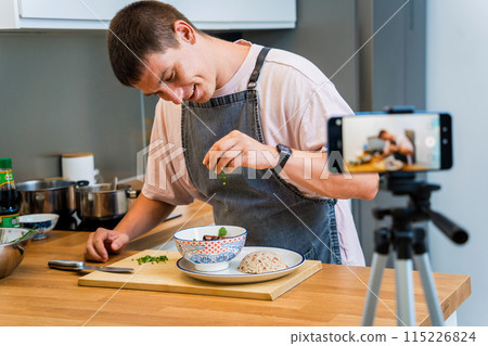 The chef is broadcasting live from workshop how to prepare a vegetarian massaman curry 115226824