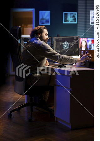 Developer inserting disk into PC containing language data models able to create conscient AI. IT admin placing cartridge in computer with machine learning data awakening artificial intelligence 115226909