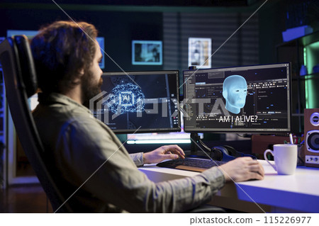 Man being asked existential questions by awaken AI on desktop PC, gaining consciousness. Remotely working IT professional speaking with artificial intelligence on computer workstation 115226977