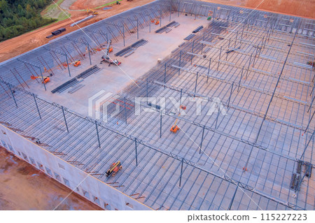 Under construction in warehouse, steel structure roof truss frame is installed Under construction in warehouse, steel structure roof truss frame is installed 115227223