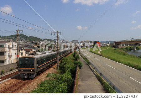 A 207 series train running along the Inagawa River near Kawanishi Ikeda Station A 207 series train running along the Inagawa River near Kawanishi Ikeda Station 115227437