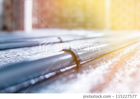 Laying Heating Systems: Installation of Underfloor Heating Pipes for Efficient Heating Premises. 115227577