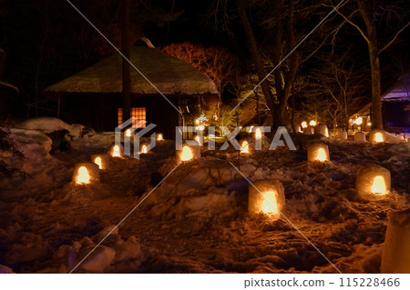 Illuminated mini igloos and old houses at Heike no Sato in Yunishigawa Onsen in winter Illuminated mini igloos and old houses at Heike no Sato in Yunishigawa Onsen in winter 115228466