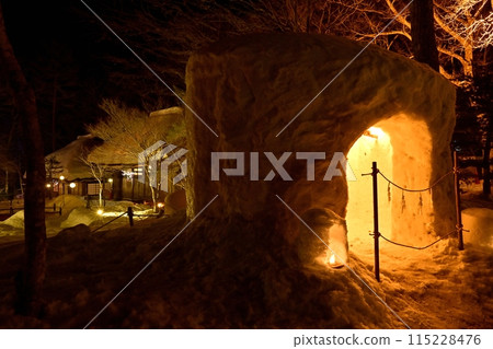 Illuminated snow igloos and mini snow igloos at Heike no Sato in Yunishigawa Onsen in winter 115228476