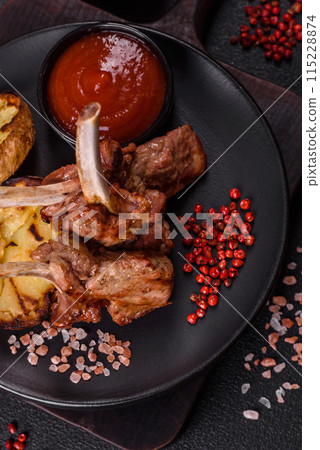 Delicious juicy meat on the bone or rack of lamb or grilled veal 115228874