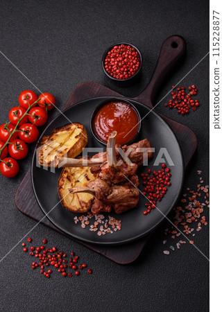 Delicious juicy meat on the bone or rack of lamb or grilled veal 115228877