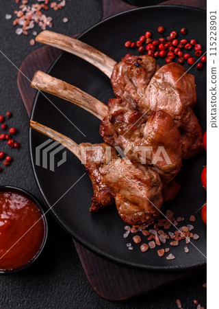 Delicious juicy meat on the bone or rack of lamb or grilled veal Delicious juicy meat on the bone or rack of lamb or grilled veal 115228901