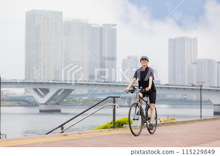 cycling woman bicycle 115229849