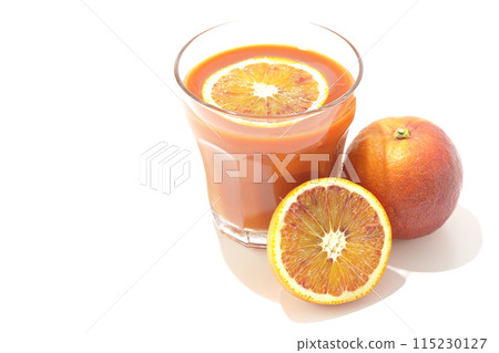 Blood orange juice photographed on a white background 115230127
